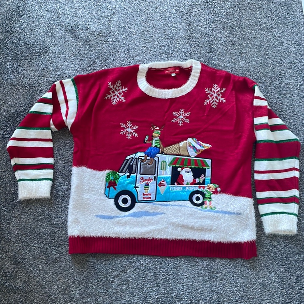 Super cool Christmas Sweater with Santa’s treat truck. Size XL